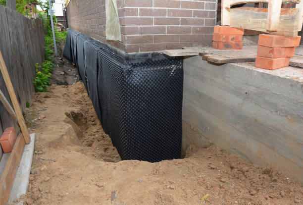 SJ Waterproofing Pros technician performing targeted Foundation Crack Repair assessment in Nesconset, NY